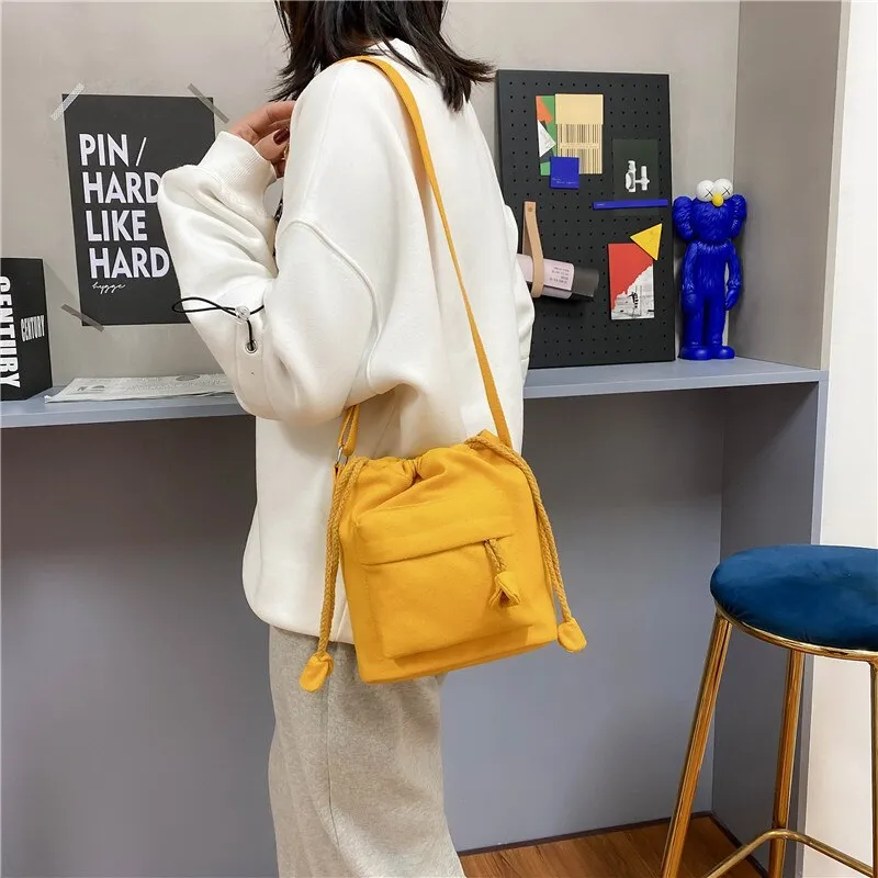 Drawstring women Bucket Bags Casual canvas Broad strap female Shoulder bag lady Tassel Crossbody messenger Bag bolsas handbag