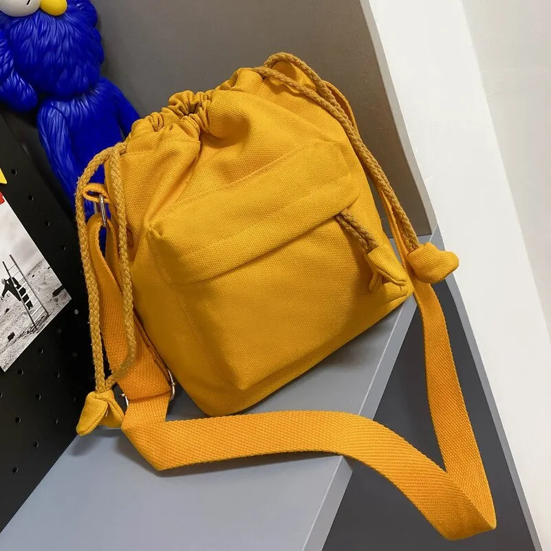 Drawstring women Bucket Bags Casual canvas Broad strap female Shoulder bag lady Tassel Crossbody messenger Bag bolsas handbag